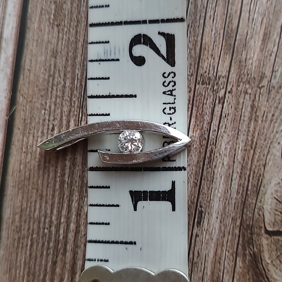 14KT WHITE GOLD TENSION SET DIAMOND PENDANT - Picture 12 of 13
